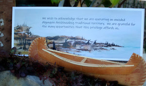 A land acknowledgement plaque recognizes the importance of the land to the Indigenous people.